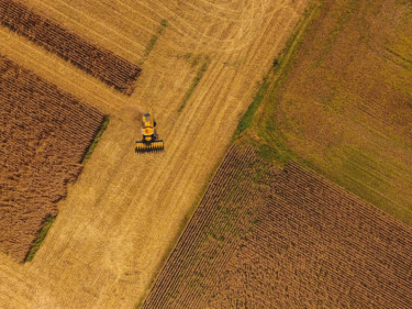 Combine driving in a field