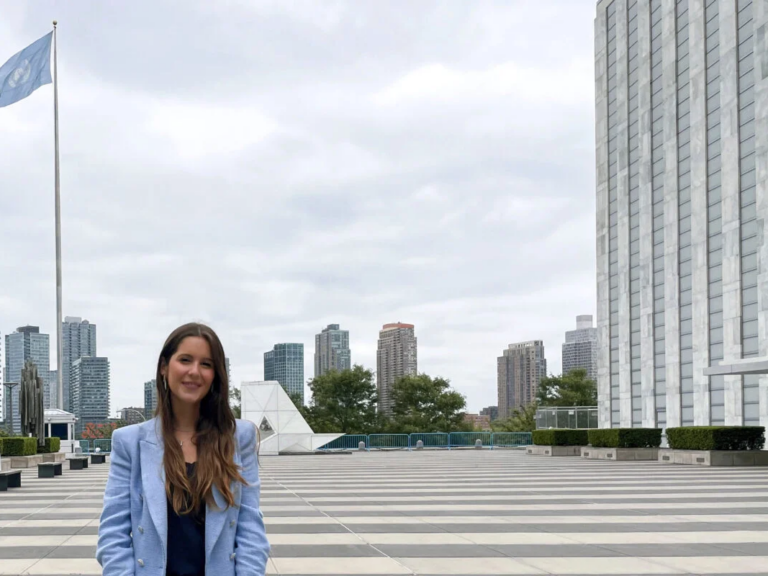 Woman standing in front of a skyline