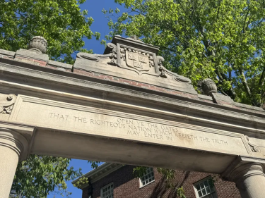 The top of a Harvard Yard gate