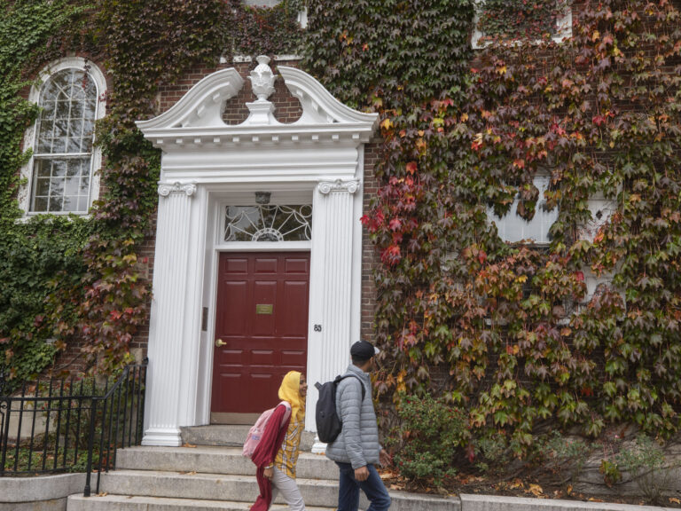 People walking by Kirkland house