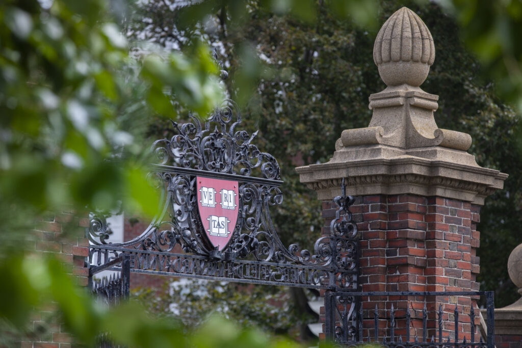 A Harvard gate with the "Veritas" shield