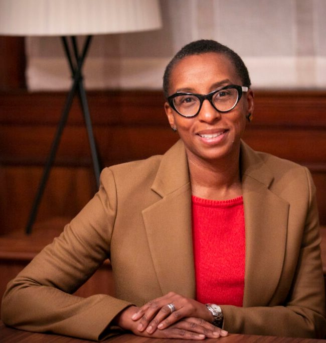 Claudine Gay at a desk