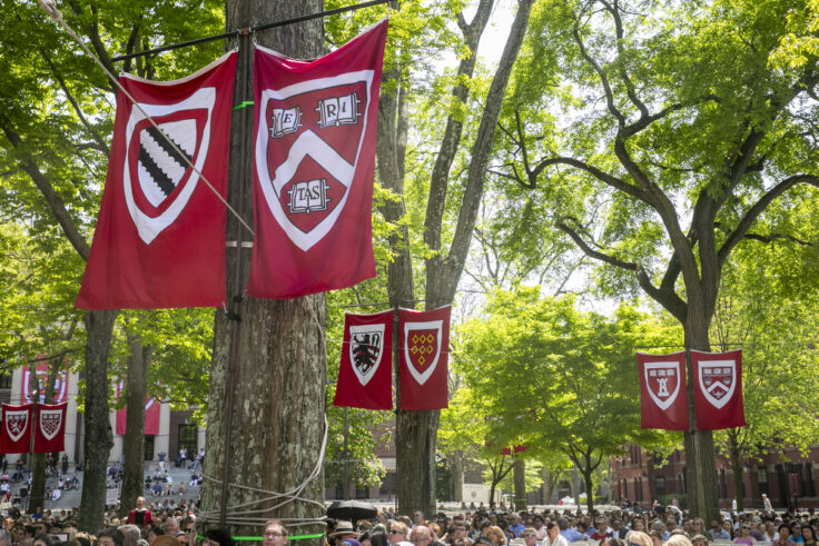 banners hang over Harvard Yard.
