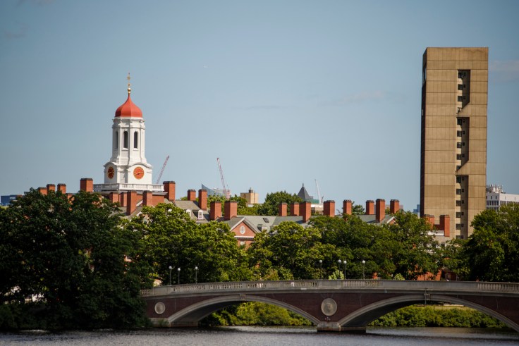 tower and bridge near a river.