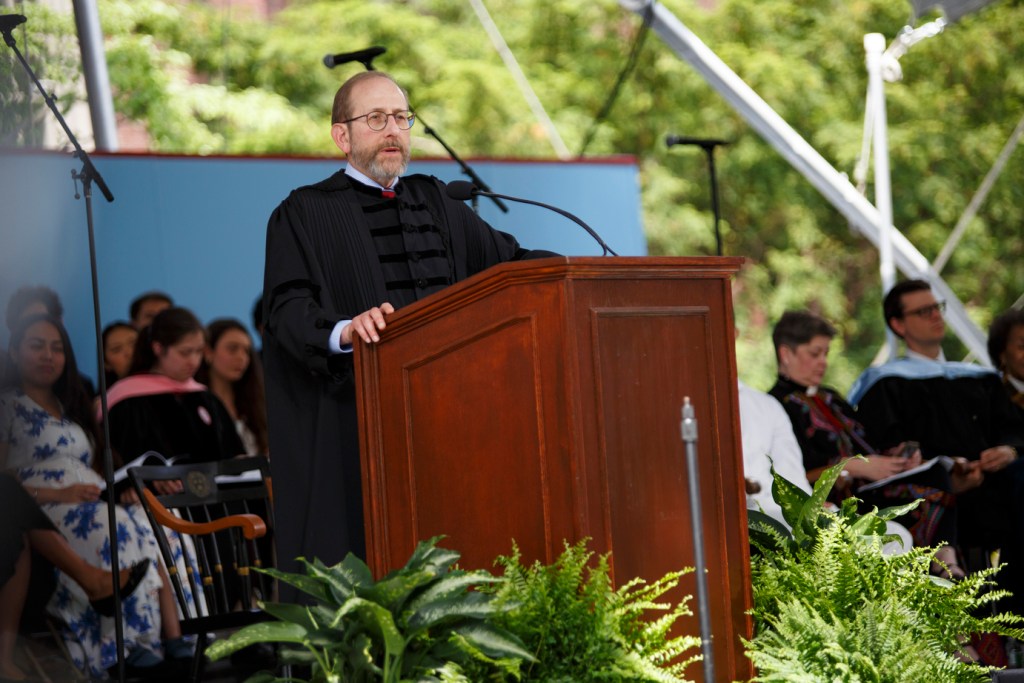 President Garber speaks at a podium.