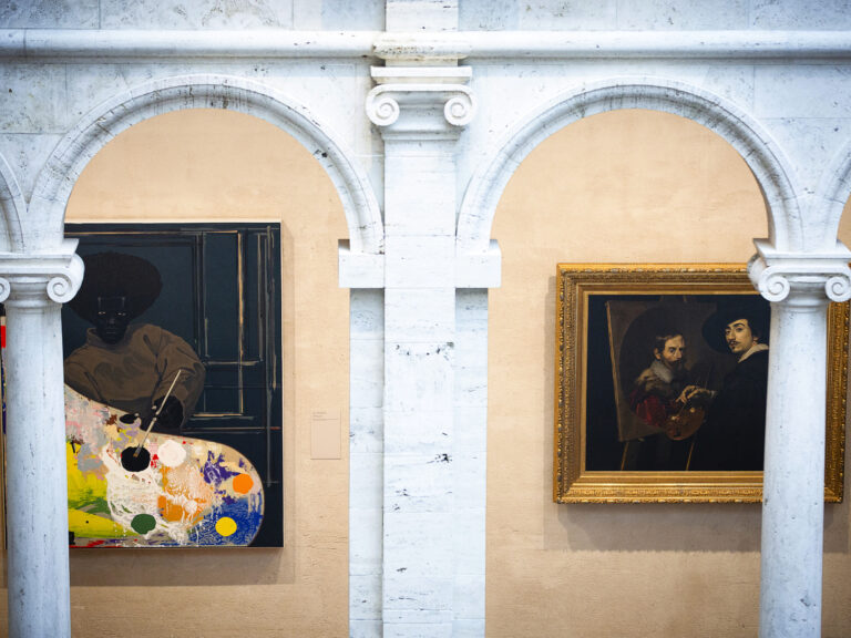 Two paintings, one classic and one modern, on the wall of the Harvard Art Museum.