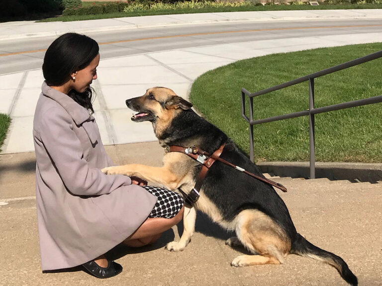 A woman and her guide dog
