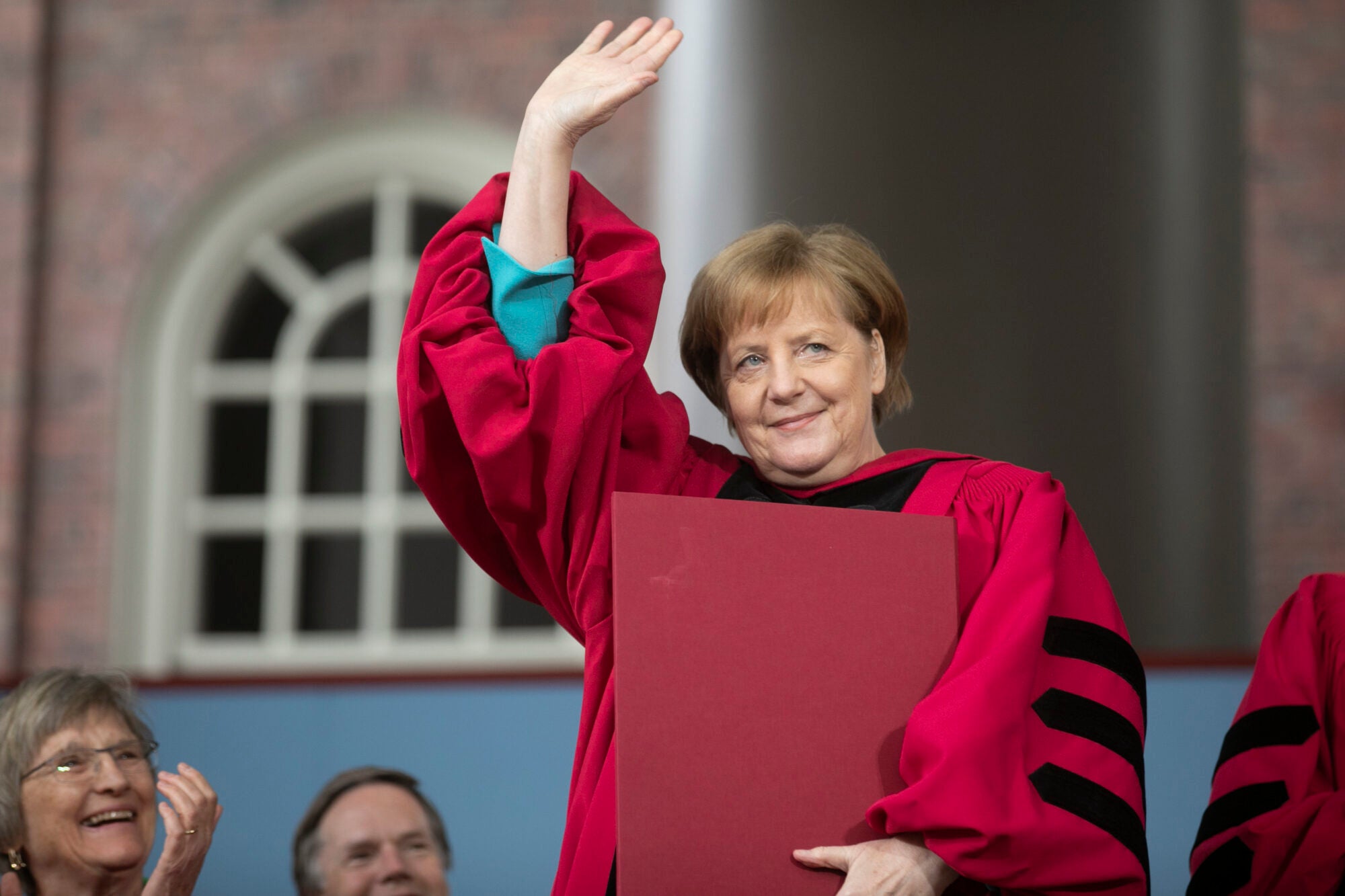 Angela Merkel waves