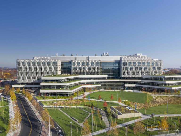 The new SEC building with green fields surrounding it