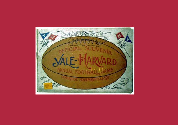 A poster of a football with Harvard Yale written on it