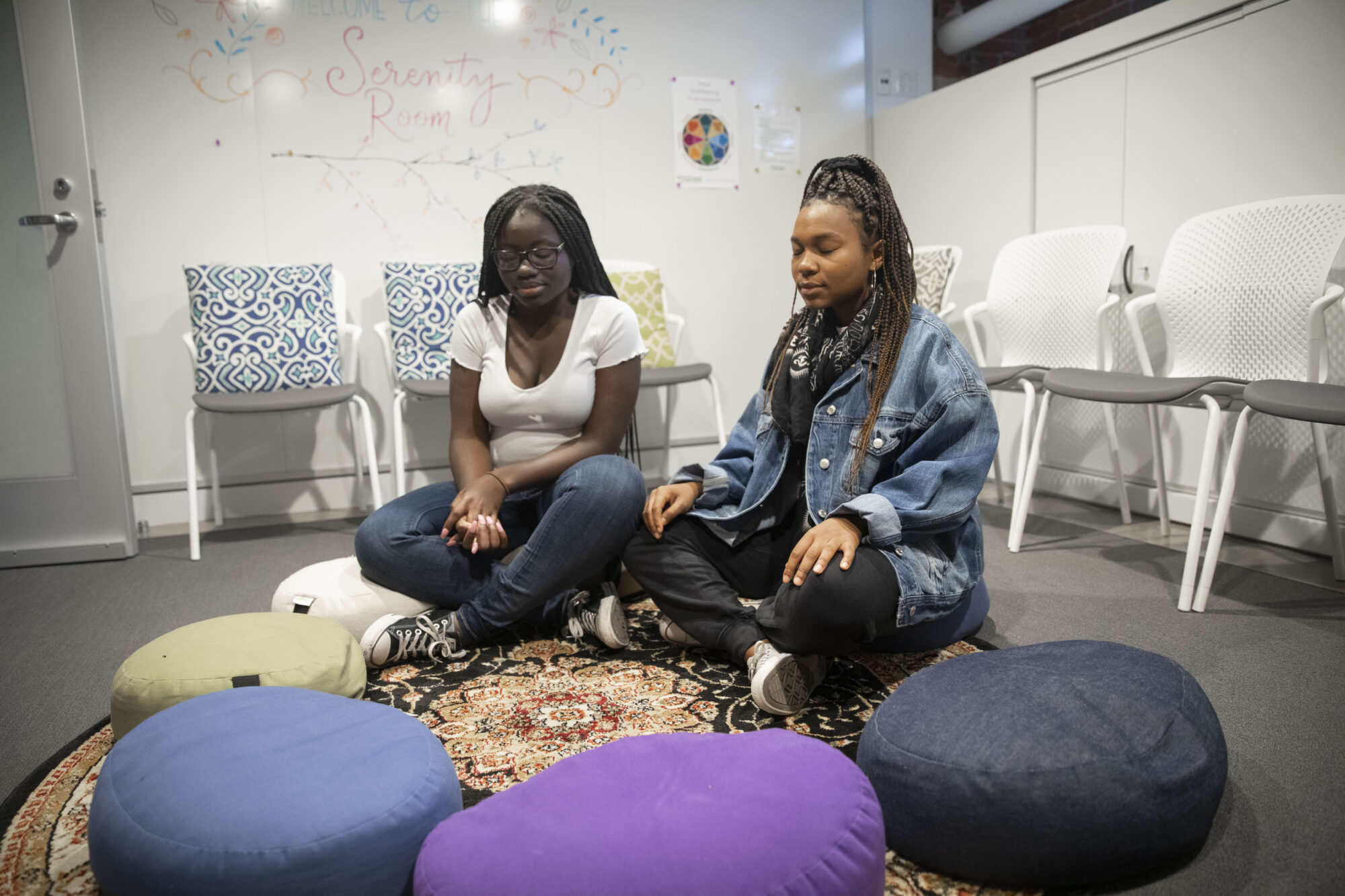 Two students meditate