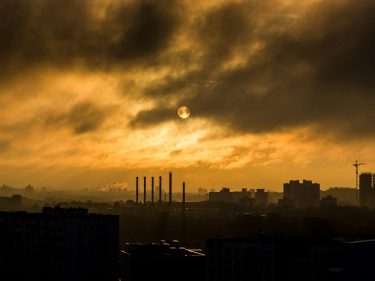 A city with smog and chimneys