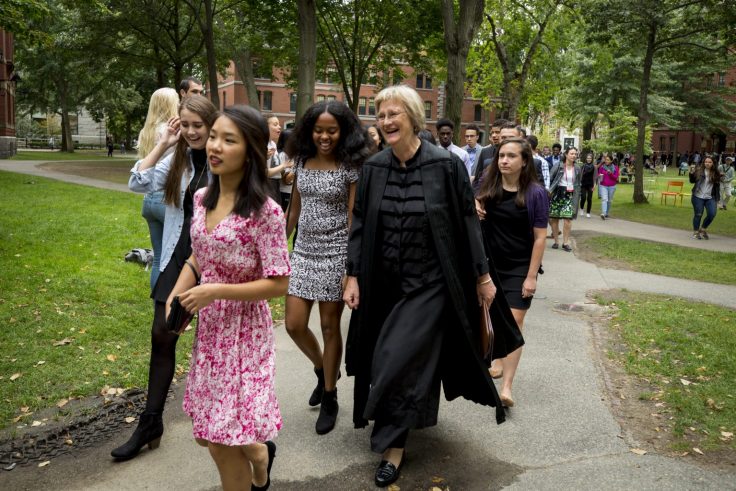 Drew Faust with some first year students