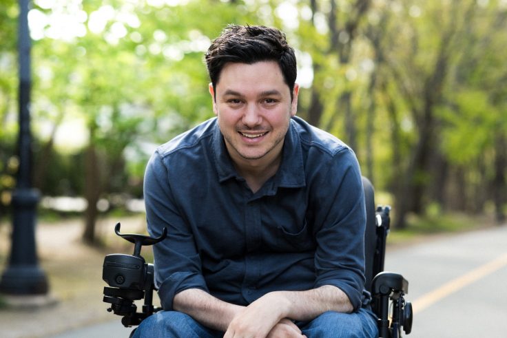 A man using a wheelchair outside