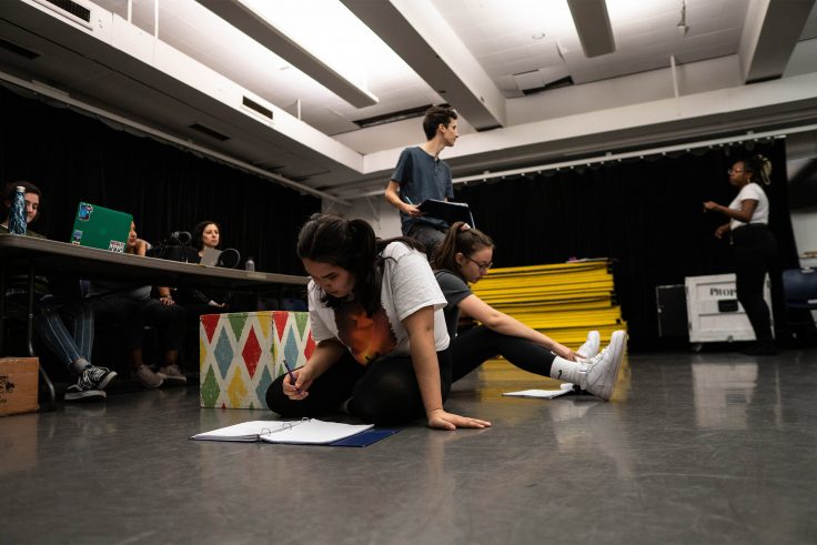 Students rehearse a play