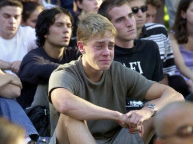 A group of students crying