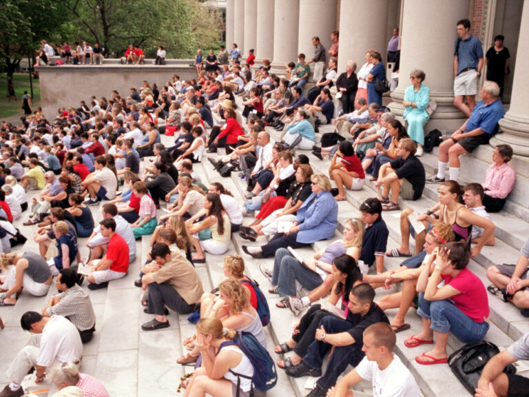 People gathered on the steps of Widner