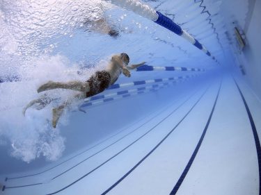 A person swimming in a pool