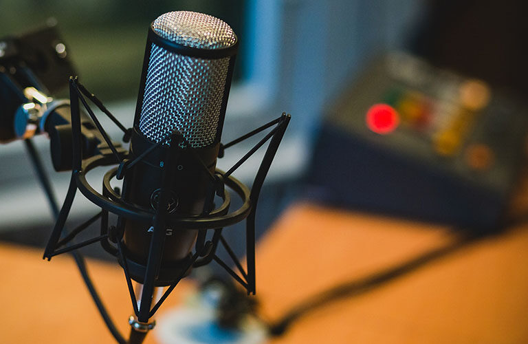 A microphone and other equipment used for making a podcast