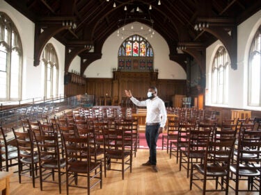 A man stands in a chapel