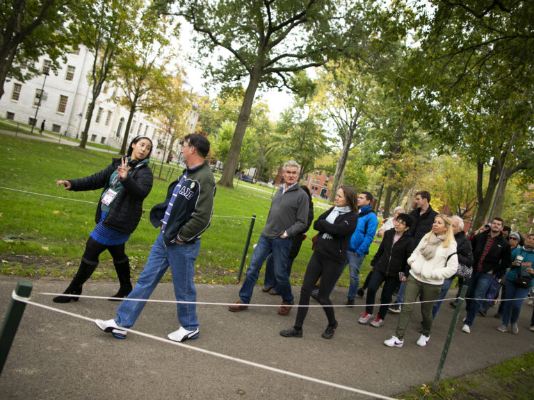 People on a tour of Harvard Yard