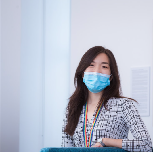 A woman wearing a mask