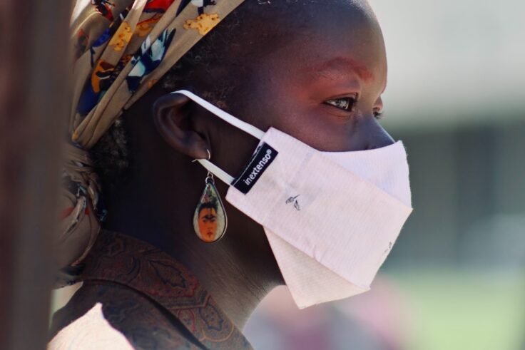 Black woman wearing a mask