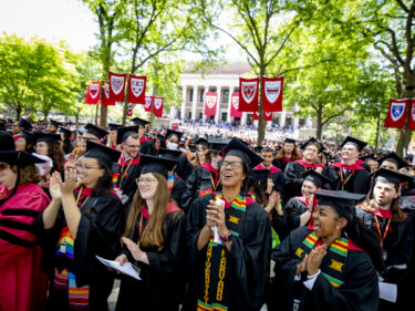 Graduating students cheering