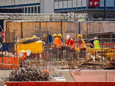 Construction workers building a building