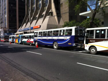 Buses lined up outside a building