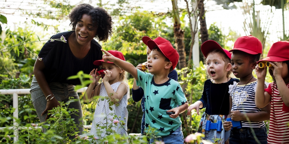 children exploring a garden