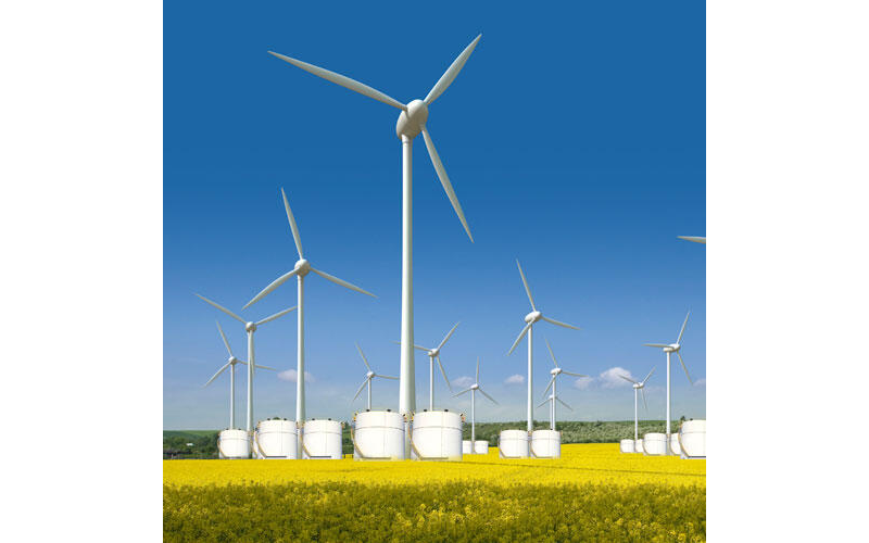 wind turbines with batteries below them