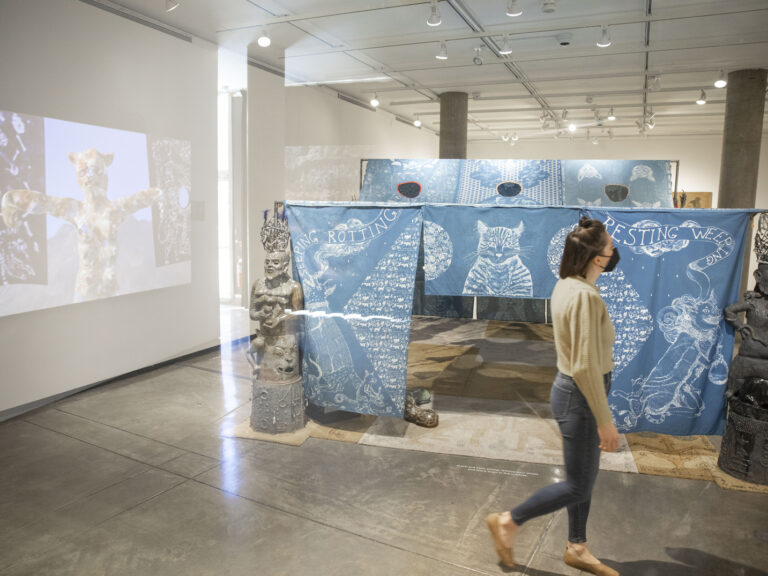A person walking through an exhibit
