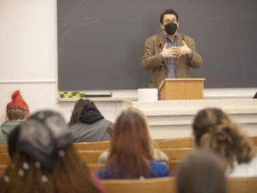 A teacher at the front of a class