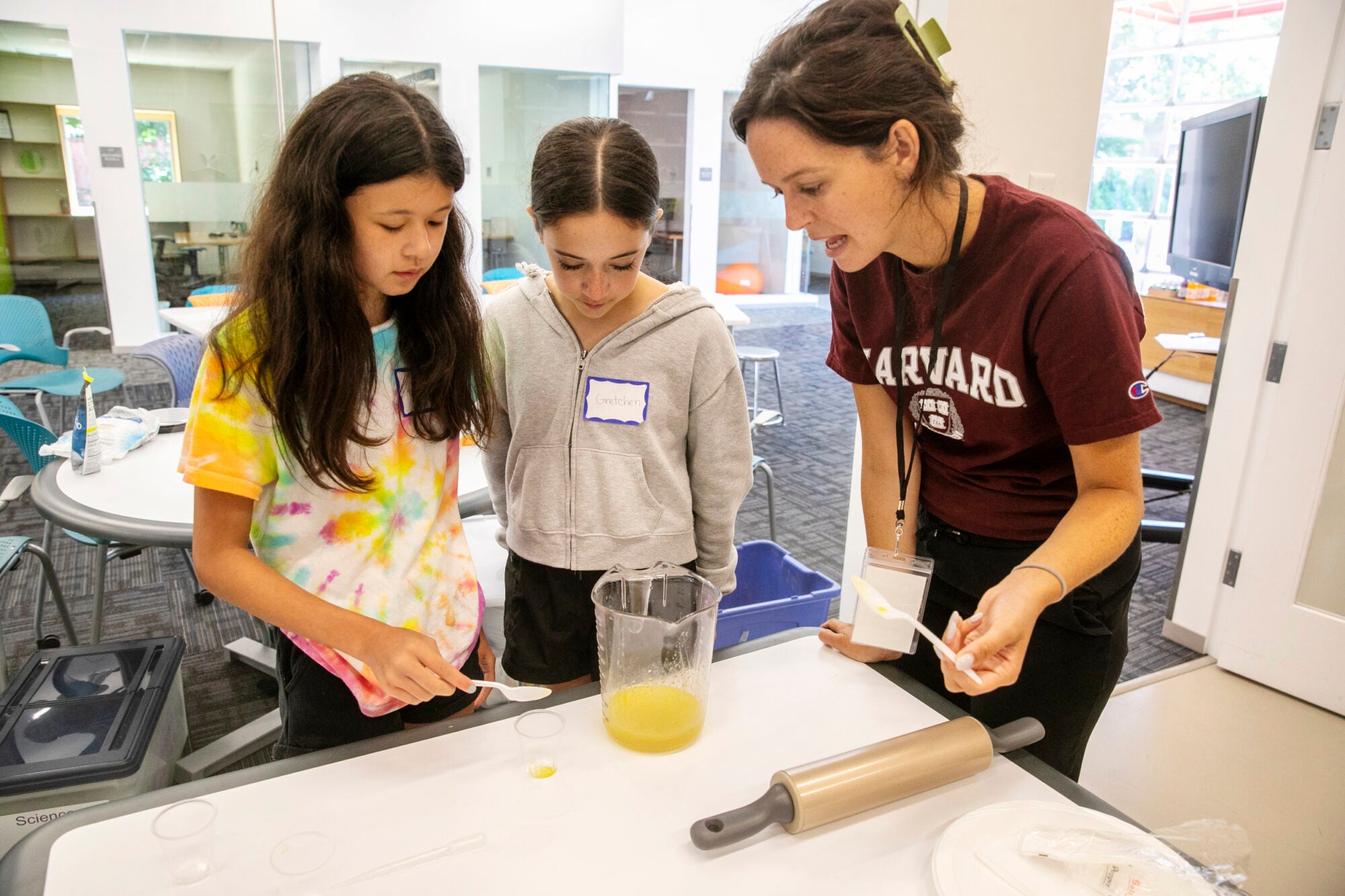 A Harvard student helps two local middle schools in a cooking class