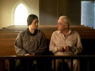 Actor Lily Gladstone and director Martin Scorsese on the set of a movie