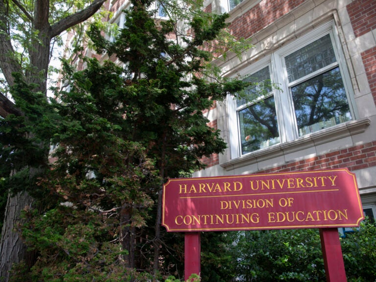 A sign that says Harvard Extension School