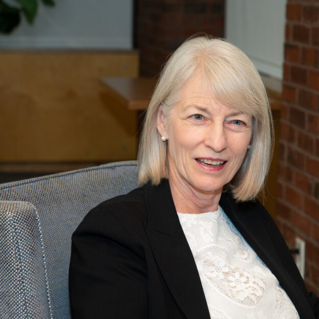 Kathryn Sikkink in a chair