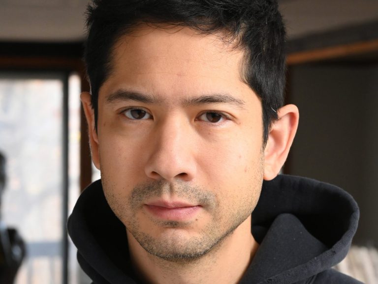 A headshot of Michael Wang