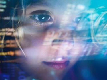 Child looking at a computer screen